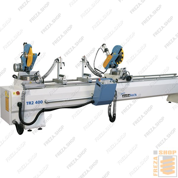 Пила двухголовочная TR2-400E (GemmaGroup, Италия) маятникового типа c ЧПУ приводом на подвижную голову, пильные диски - 400мм, укомплектована - 2 вертикальными, 2 горизонтальными пневмоприжимами, боковым рольгангом, системой подачи СОЖ, промежуточным упор